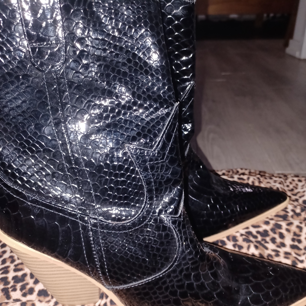 Elegant Black Snakeskin Heeled Boots